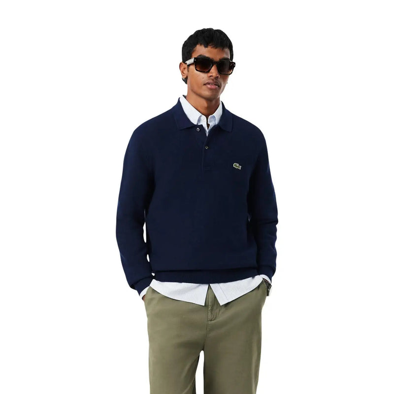 Lacoste Wollpullover für Herren in Marineblau mit grünem Krokodillogo auf der linken Brust, Vorderansicht