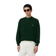 Lacoste Wollpullover für Herren in Dunkelgrün mit gesticktem Krokodillogo auf der linken Brust, Vorderansicht