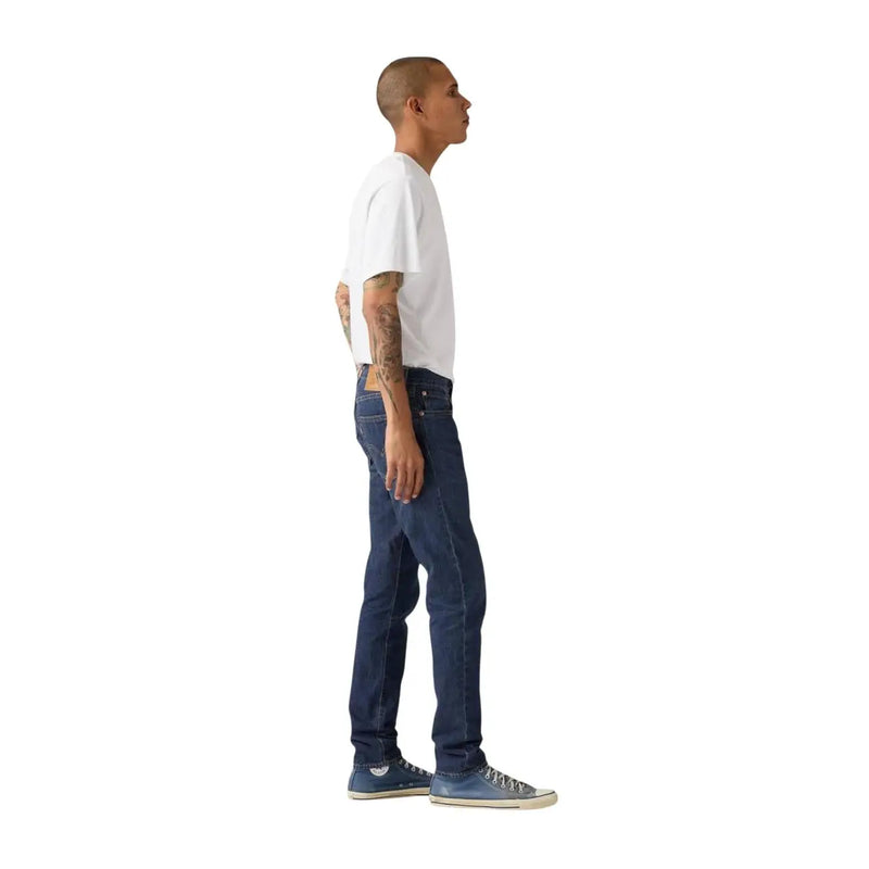 Levis men blue cotton linen jeans in dark wash with classic five pockets and brown leather patch on back waistband