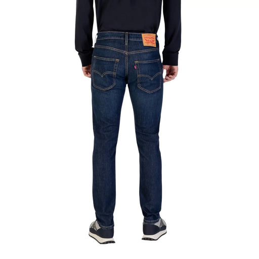 Levi's Slim-Fit-Jeans für Herren in Dunkelindigo mit Fünf-Taschen-Design und Kontrastnähten, Rückansicht