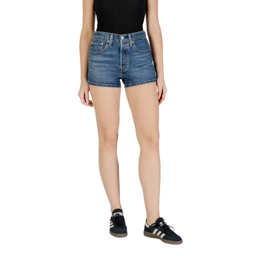 Levis women blue cotton blend high waisted denim shorts in medium blue wash with classic stitching and button closure
