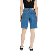 Levis women blue cotton denim shorts with classic five-pocket design and tan leather patch on back waistband