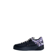 Levis women’s black leather platform sneaker with white laces and purple gray leopard print accent on the heel back side