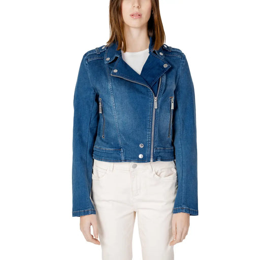 Light blue denim moto jacket with silver zippers, snaps and side pockets