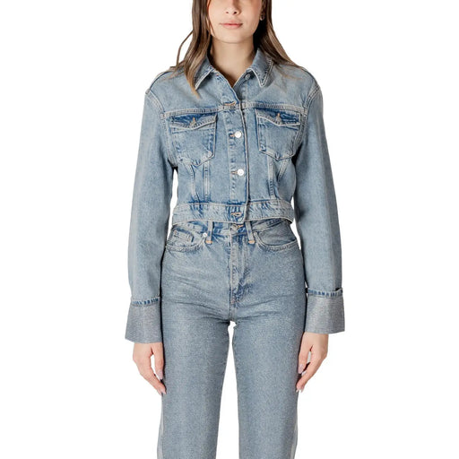 Light blue denim jacket with light-wash fabric, classic collar, button-front closure, and two chest pockets