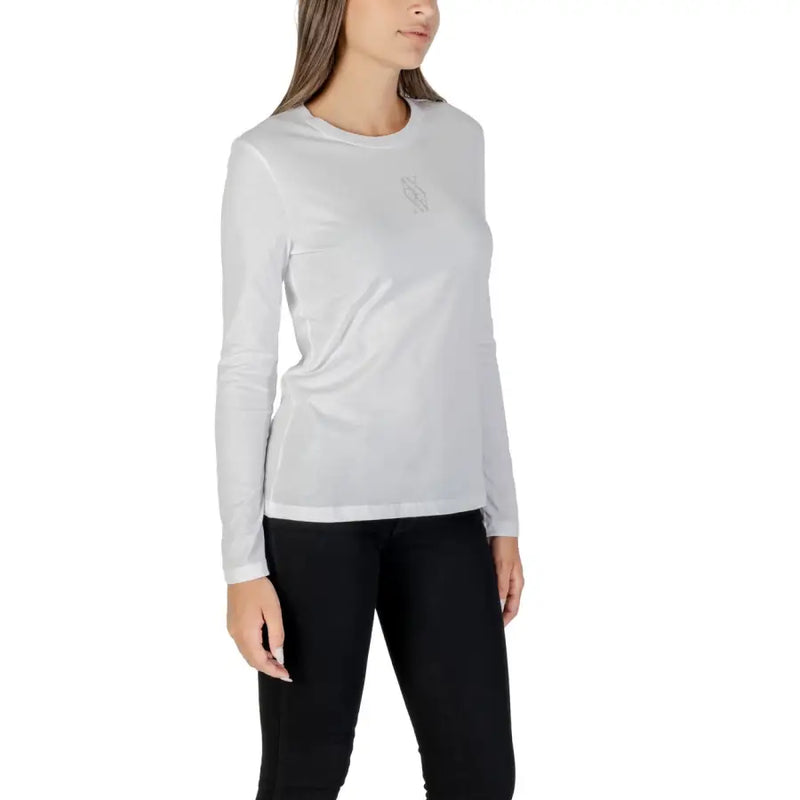 Light gray long-sleeved athletic top worn by a woman from Armani Exchange with rhinestone print