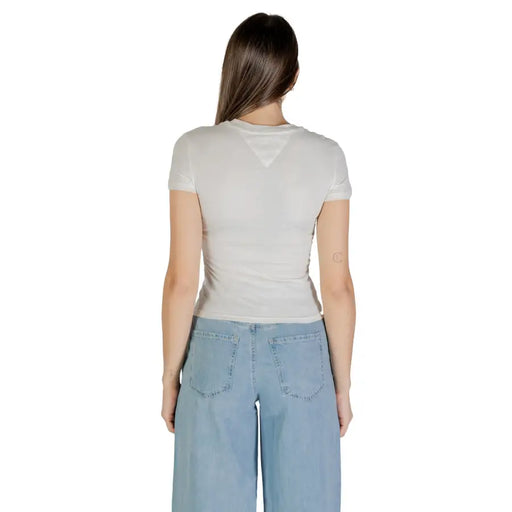 Light grey fitted short-sleeve T-shirt paired with light blue wide-leg jeans by Tommy Hilfiger Women
