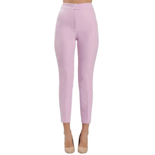 Light pink high-waisted trousers stylishly showcased for contemporary fashion