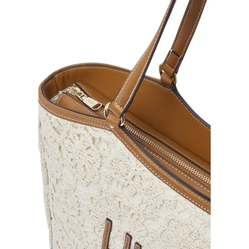 Liu Jo beige cotton handbag with white lace top, tan leather handles, trim, and gold-tone zipper pocket
