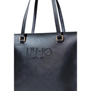 Black textured faux leather tote bag with shoulder straps and gold-tone hardware