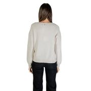 Woman wearing Liu Jo White Long V Neck Rhinestone Trim Knit Sweater
