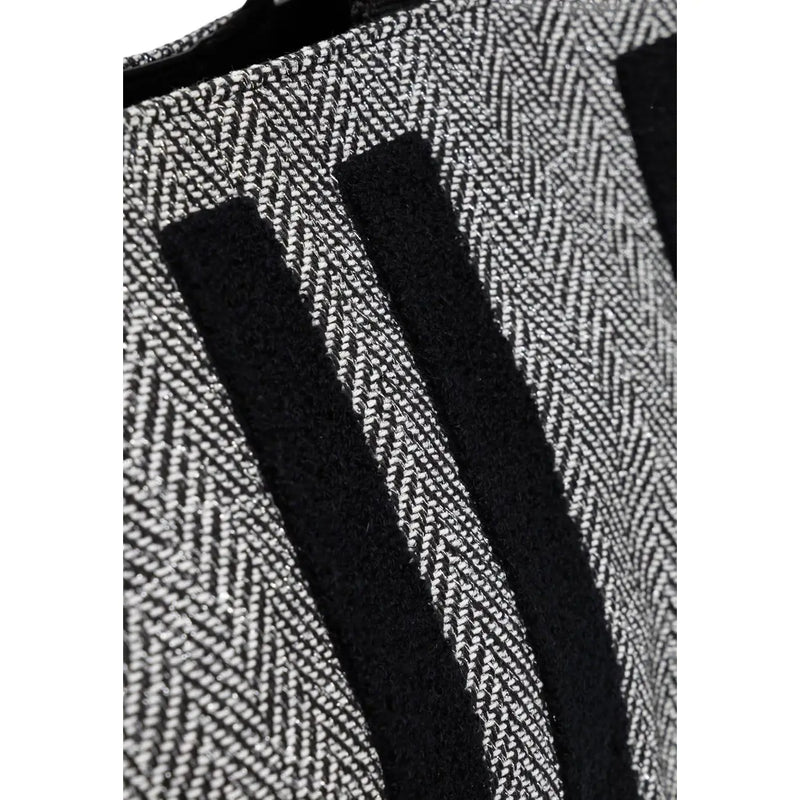 Liu jo women black polyester handbag 40x29x15 cm shown with black and white herringbone wool coat with bold stripes