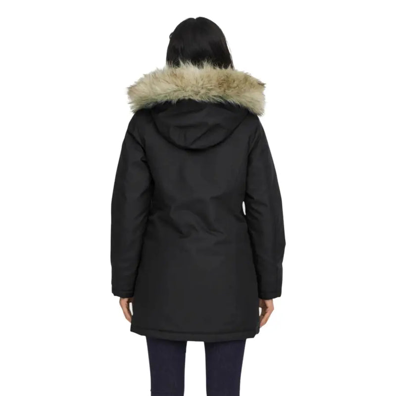 Long black hooded jacket for women with zip and automatic buttons featuring tan fur-lined hood winter parka