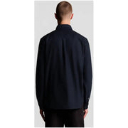 Navy blue long sleeve cotton shirt by lyle and scott with classic collar and subtle back pleats shown from the back