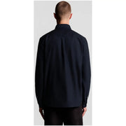 Navy blue long sleeve cotton shirt by lyle and scott with classic collar and subtle back pleats shown from the back