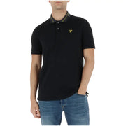 Lyle and Scott Herren-Polohemd, schwarz, kurzärmelig, aus Baumwollmischgewebe, mit grün-gelbem Kragenbesatz und gelbem Vogellogo
