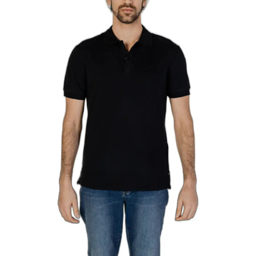 Man in Gas - Gas Men Polo exemplifies urban city style fashion with black polo shirt