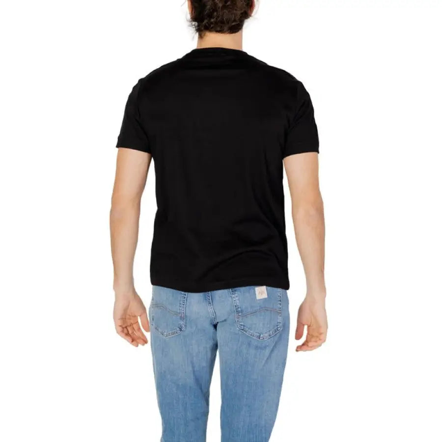 Ea7 Ea7 Men T-Shirt model wearing black shirt and jeans