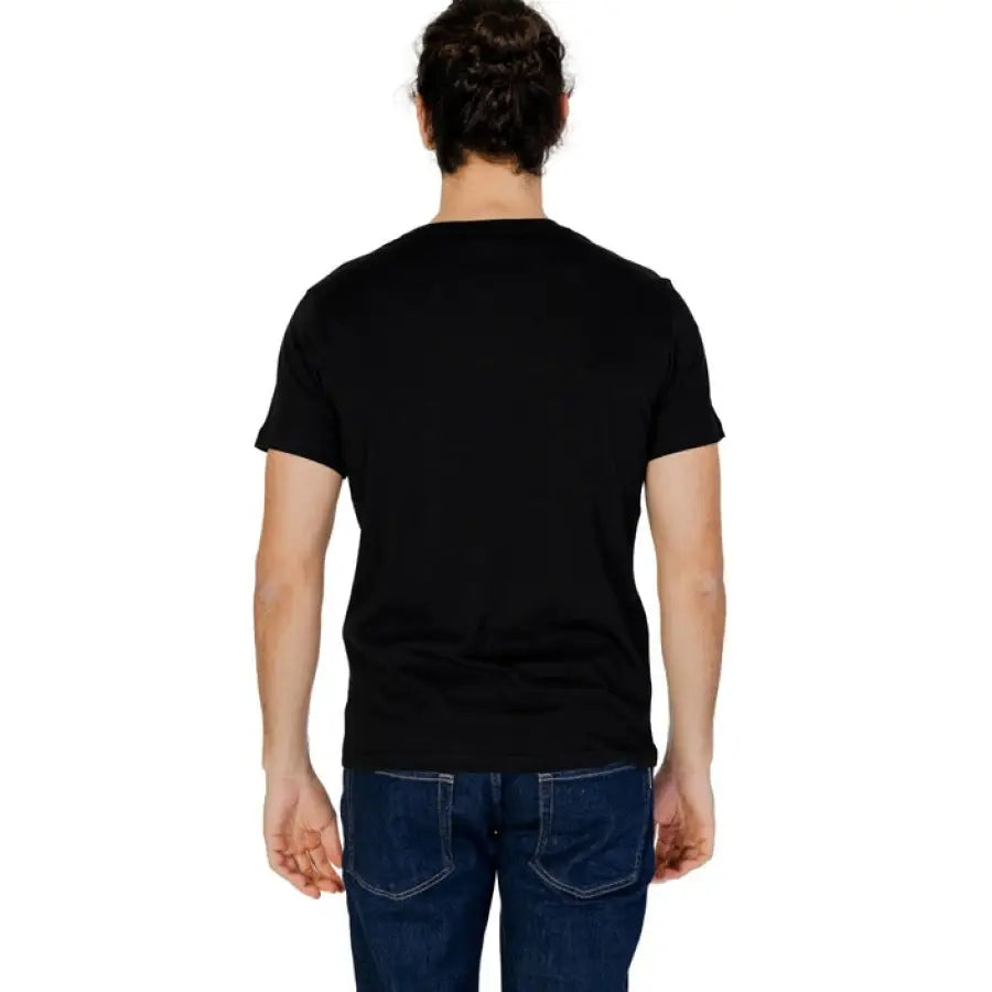 
                      
                        Man modeling Emporio Armani Underwear T-Shirt in black
                      
                    