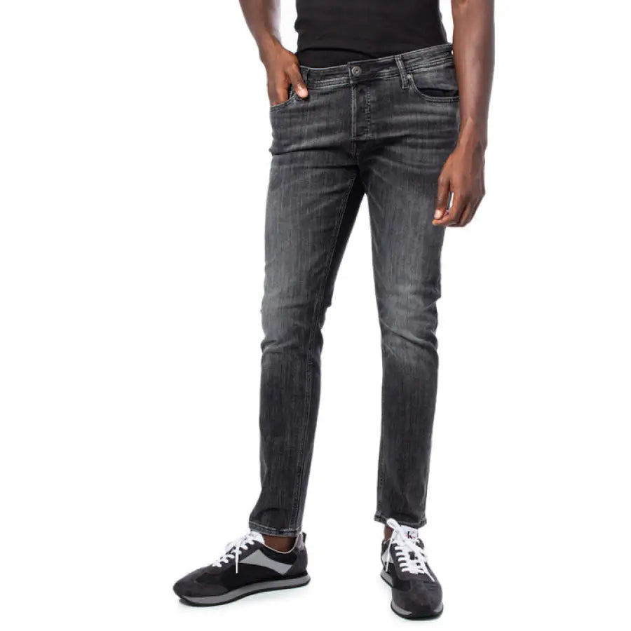 Jack & Jones men jeans modeled in urban style clothing by a man in black shirt