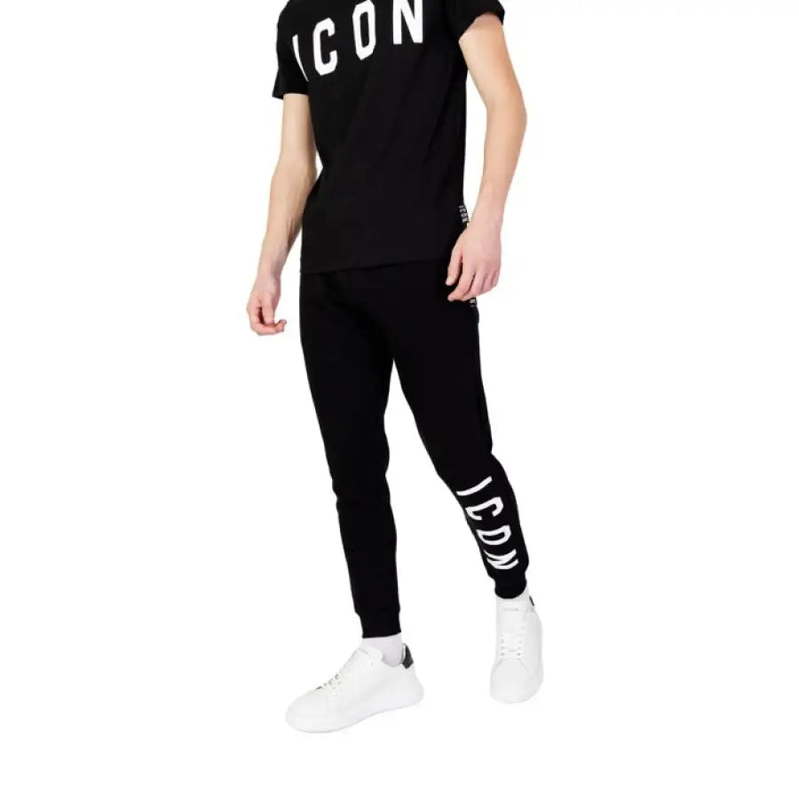 
                      
                        Icon Icon men in black Icon Men Trousers and shirt, showcasing style
                      
                    