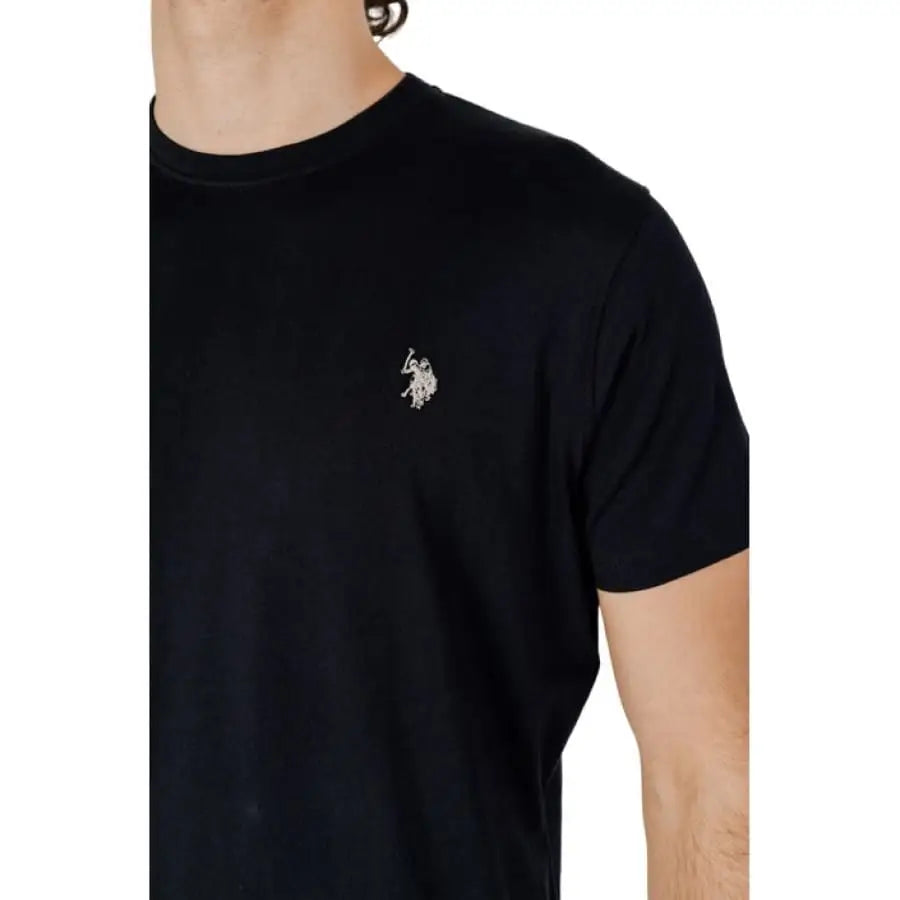 
                      
                        Man in U.S. Polo Assn. men t-shirt with white horse embroidery, apparel accessories.
                      
                    