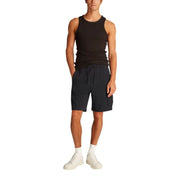 Man wearing black tank top and cargo shorts featured in Black Tank Top and Cargo Shorts for Men