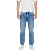 Man wearing Light Blue Denim Jeans for Men and a white T-shirt