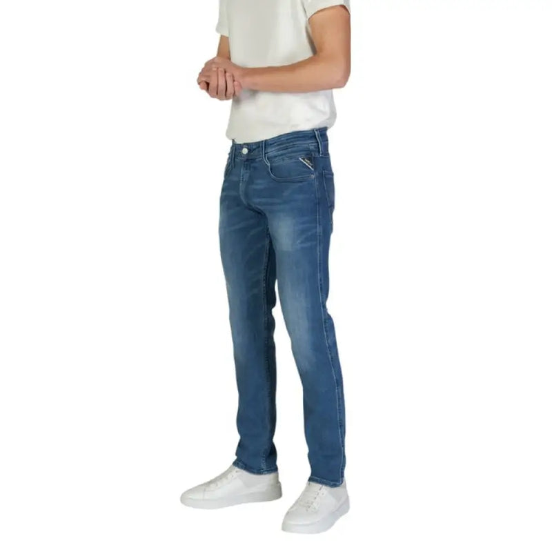 Man in blue jeans and white sneakers wearing Replay Blue Men Trousers Spring Summer
