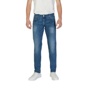 Man wearing Replay Blue Men Trousers Spring Summer with white sneakers