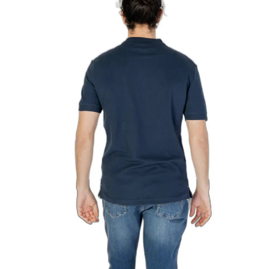 Man in blue polo shirt showcasing Gas - Gas Men Polo for urban city fashion