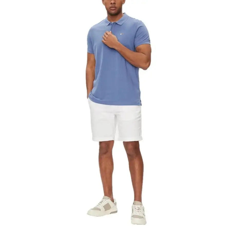 
                      
                        Man wearing Tommy Hilfiger Jeans Men Shorts in blue polo and white shorts
                      
                    