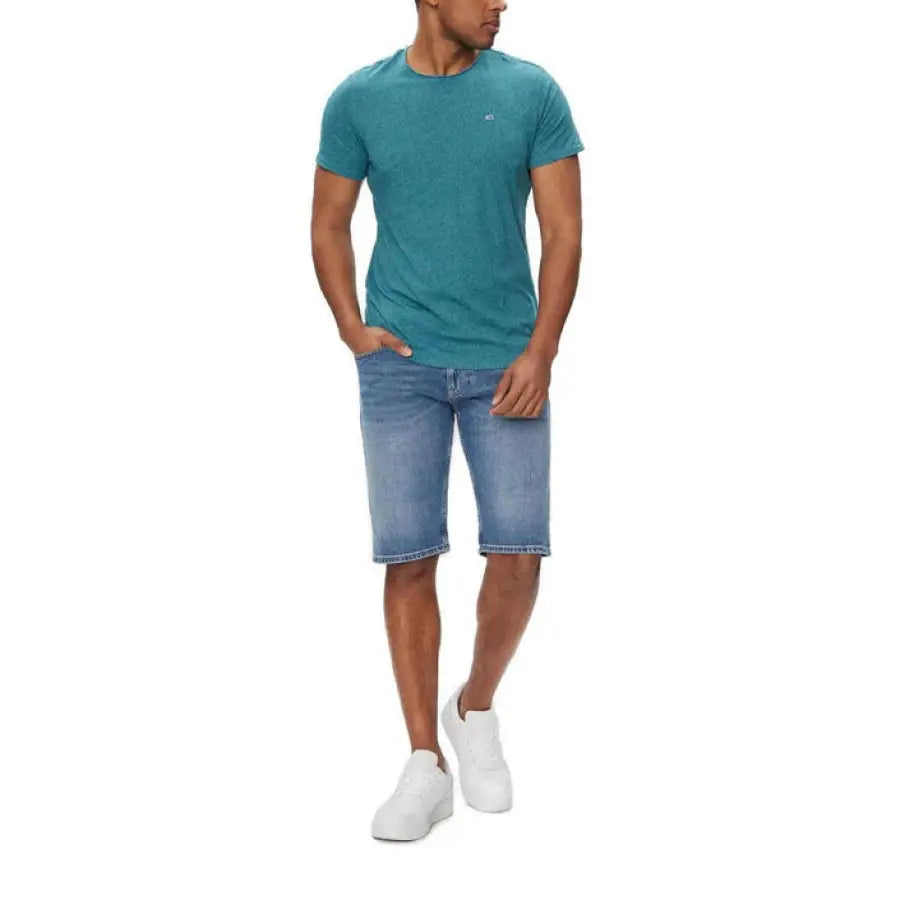 
                      
                        Man modeling Tommy Hilfiger jeans men’s denim shorts
                      
                    
