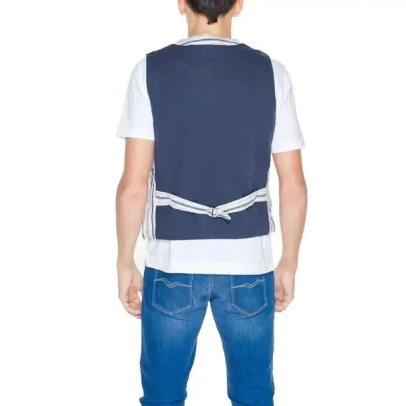 A man wearing a Gianni Lupo blue vest, featured in the Gianni Lupo Men Gilet collection
