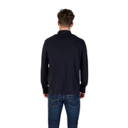 Man wearing Navy Long Sleeved Polo Shirt in dark blue with jeans, front view