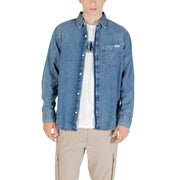 Man wearing a denim shirt and khaki pants displayed in Men Blue Denim Long Sleeved Shirt product image