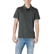 Man wearing gray polo shirt and blue jeans promoting Ea7 Men’s Beige Polo in Cotton Blend