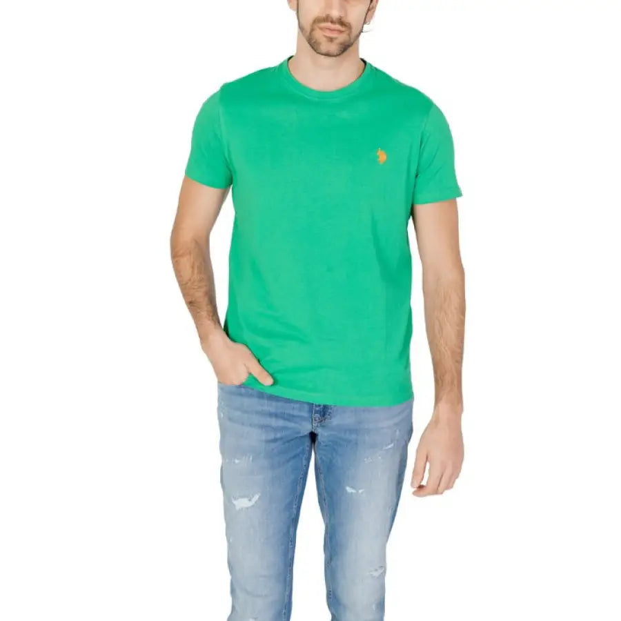 Man in green U.S. Polo Assn. men t-shirt embodying urban style clothing