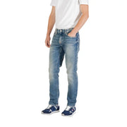 Man wearing light blue jeans and blue sneakers from Men Light Blue Jeans and Blue Sneakers collection