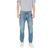 Man wearing Light Blue Denim Jeans and Gray T-Shirt displayed in Men’s Light Blue Denim Jeans product image