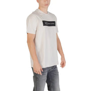 Man wearing a light-colored T-shirt with a black logo for Mens Light Colored T Shirt with Black Logo
