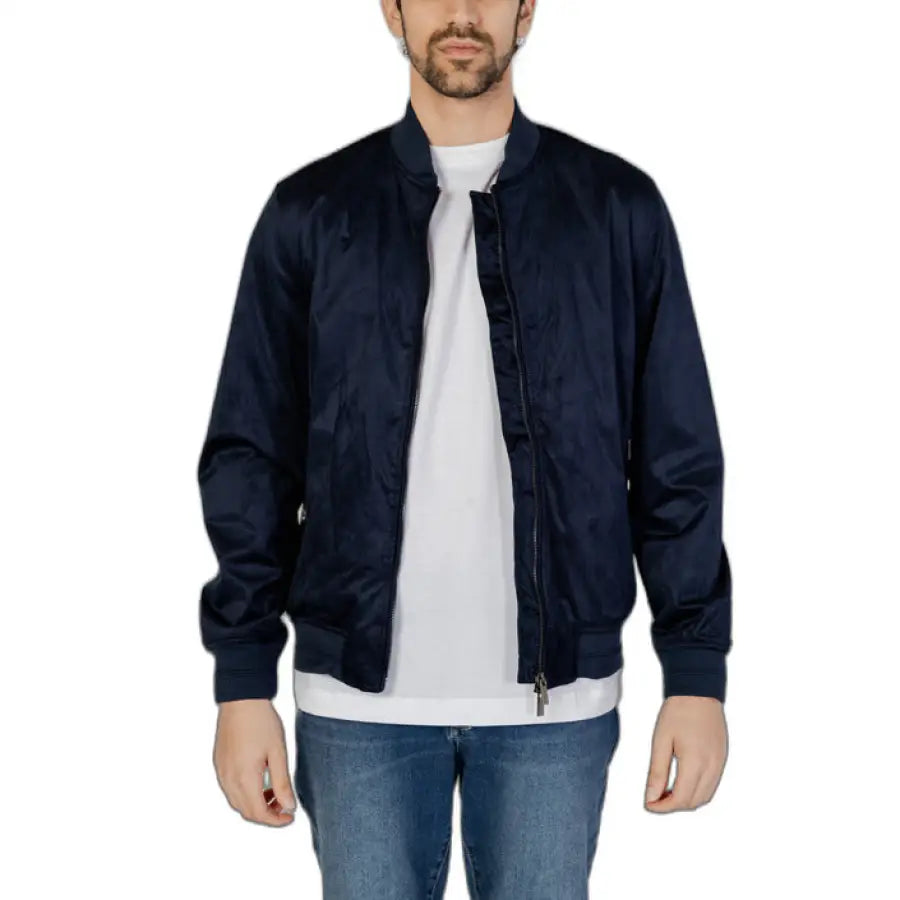 Man in navy bomber jacket showcasing urban city style from Hamaki-ho collection