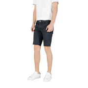 Man wearing navy shorts from Mens Casual Shorts T Shirt And Sneaker Collection