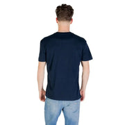Man wearing Tommy Hilfiger Navy Blue T Shirt and jeans for casual style