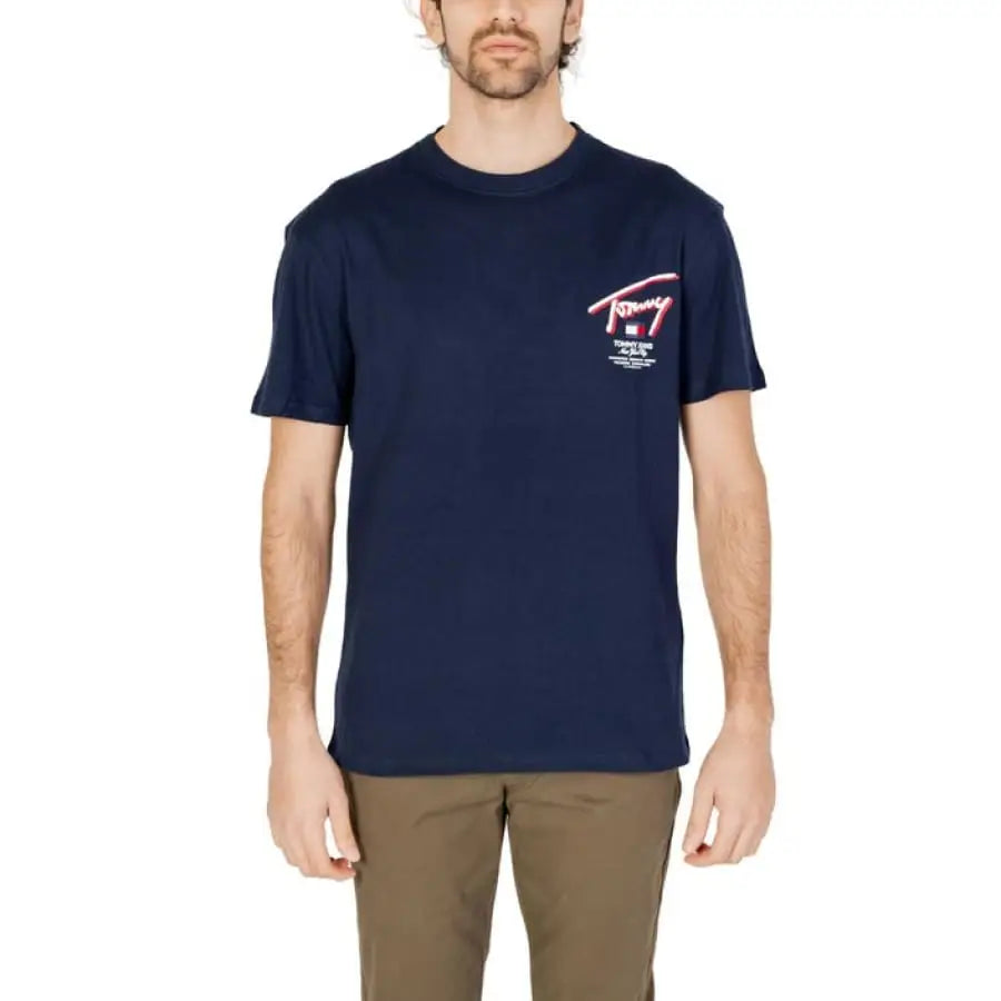 Man in Tommy Hilfiger Jeans navy t-shirt with red and white logo