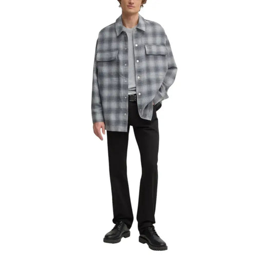 Man wearing a plaid shirt jacket showcasing Mens Black Straight Leg Trousers