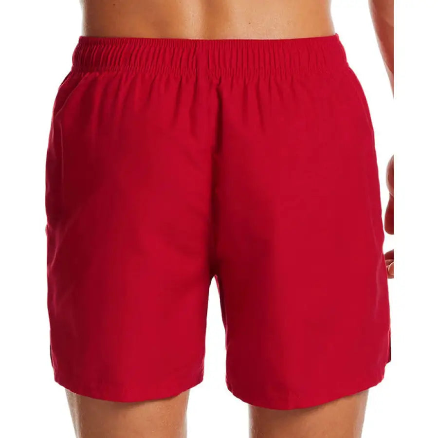 
                      
                        Man in Nike Swim red shorts - Nike Swim Men Swimwear feature
                      
                    