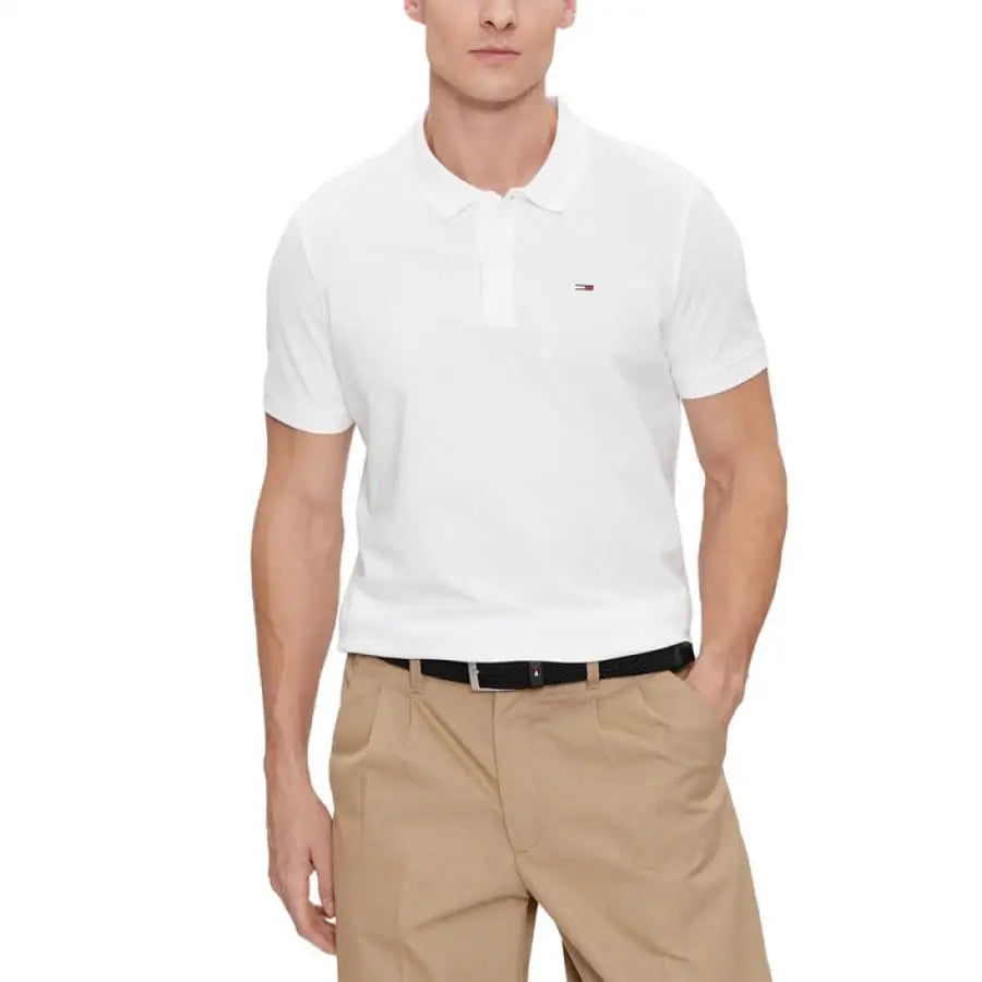 Man in Tommy Hilfiger Jeans white polo and khaki pants