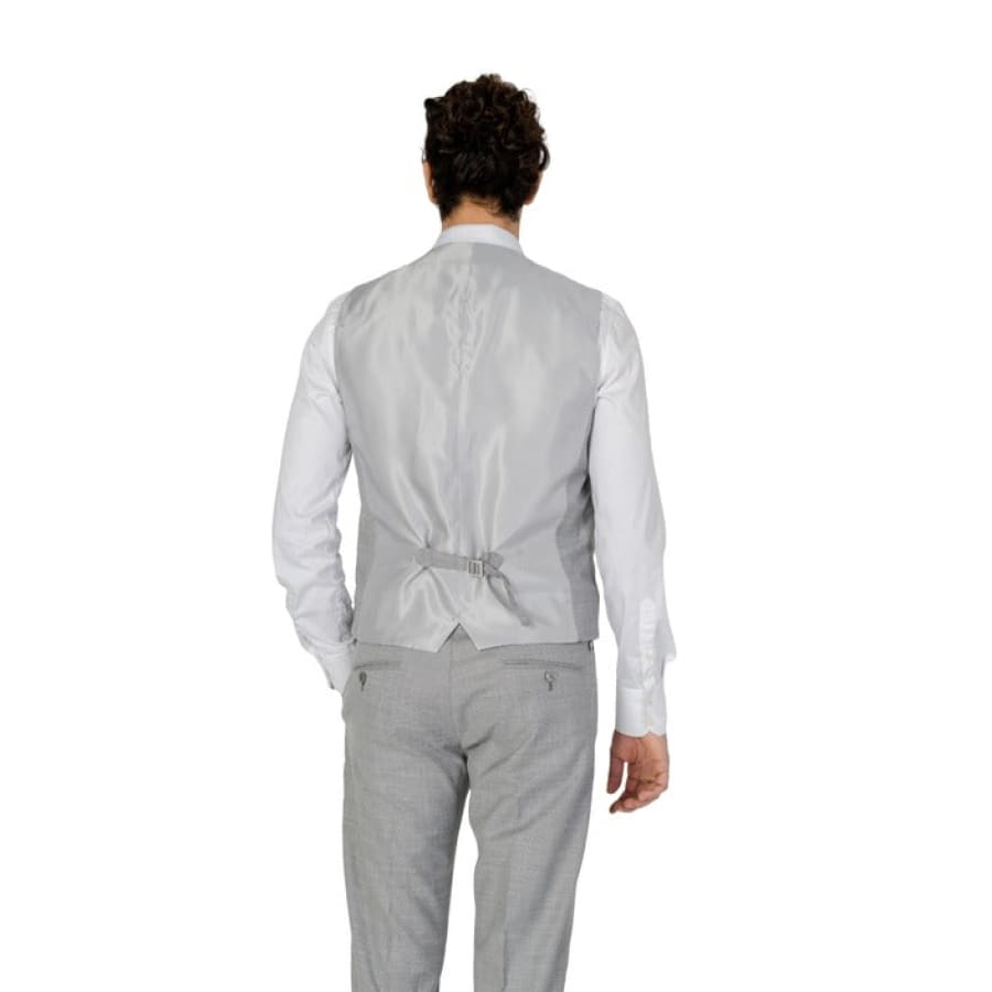 Antony Morato Men Gilet featuring model in white shirt and grey pants.