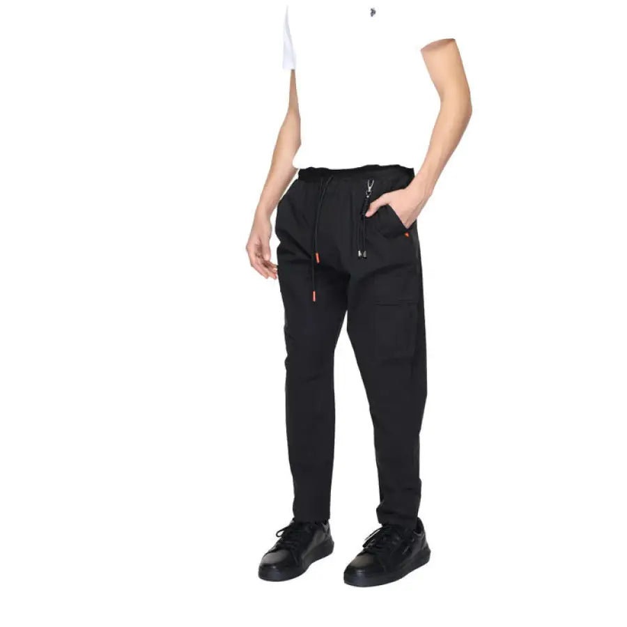 
                      
                        Man modeling Gianni Lupo Men Trousers in white shirt and black pants
                      
                    